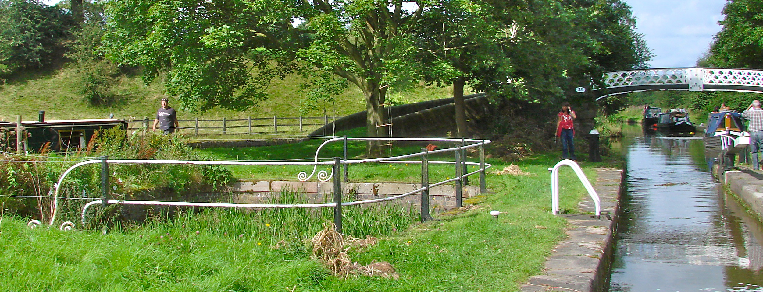 Caldon Canal: Hazelhurst Junction: Left barge is on Leek Branch and bridge spans the Caldon